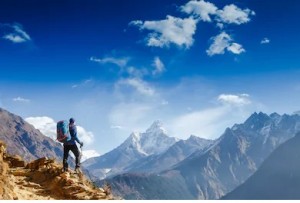 Hiker steps to Mt. peak_happy-hiker-winning-reaching-life_366801260